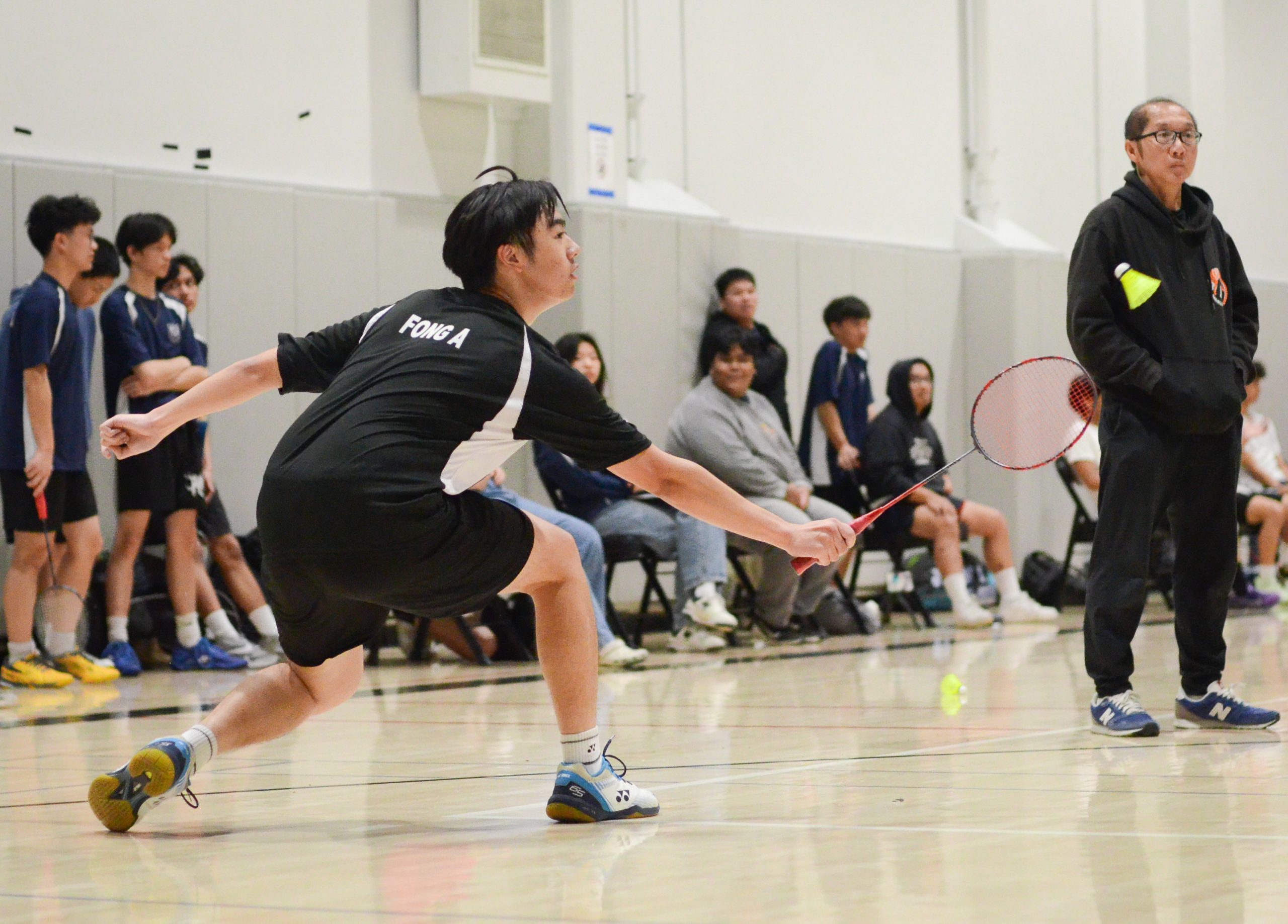 Badminton slides past Redlands 12-9 in home opener
