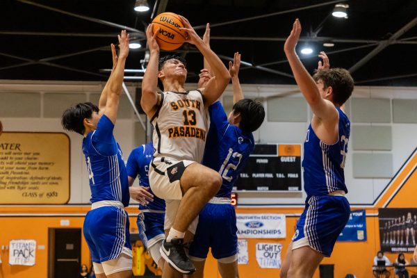 Boys’ basketball falls to San Marino in season-opening game